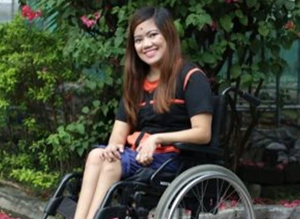 Michelle Fernandez sitting on a wheelchair